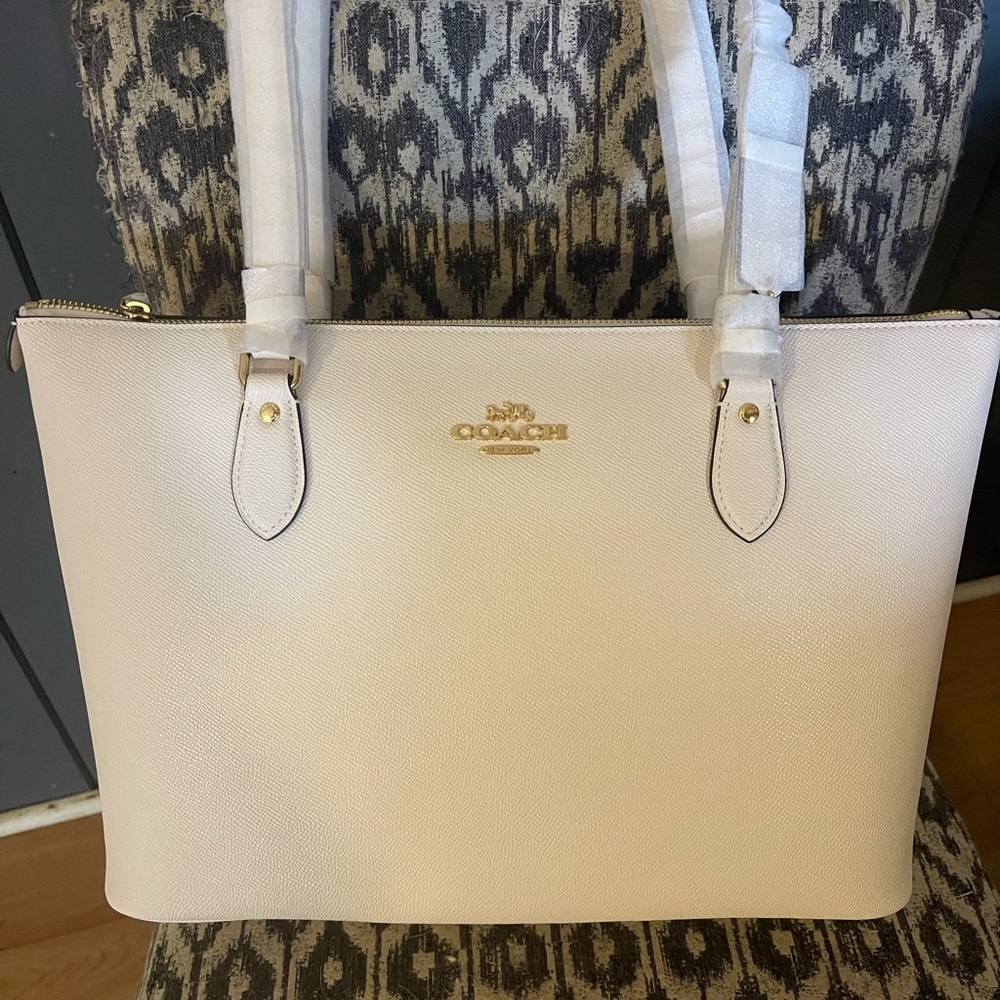 Coach Cream Tote Bag with Gold Logo and Structured Design
